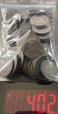 Pose med ca. 400 gr. diverse udenlandske mønter